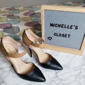 Black and brown pumps